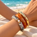 طقم أساور رمادي وبرتقالي مجزّع وذهبي (Bracelet Stack: Grey & Orange Marbled with Gold Tube Bangle)