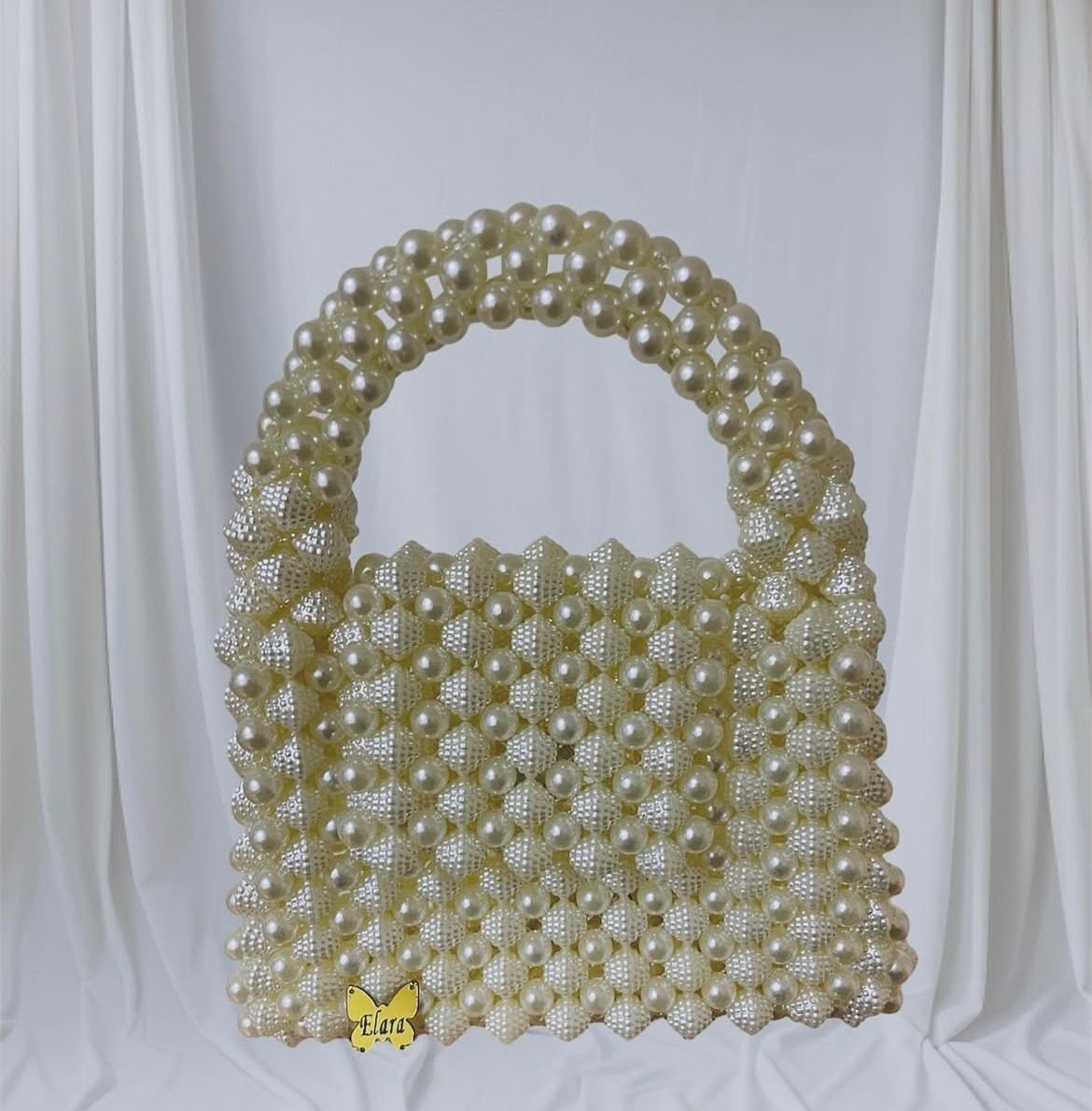 شنط يدويه مصنوعه من الخرز